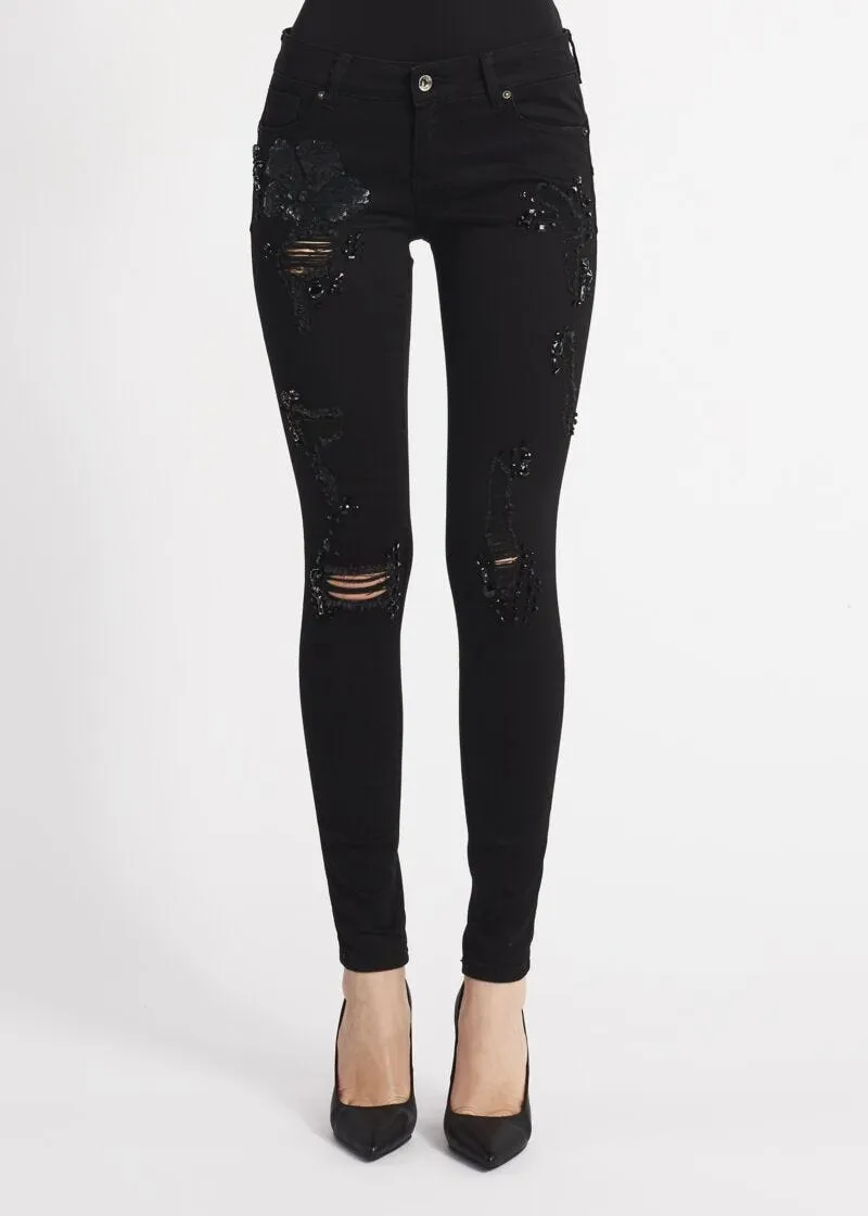 Jeans skinny con paillettes